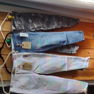 3 pairs of democracy pants size 8 rainbows are reflection from window